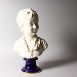 A SEVRES WHITE PORCELAIN BUST OF A YOUNG BOY, on a blue and gilt pedestal. 18ins high. Printed