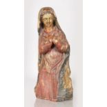 A 16TH-17TH CENTURY CARVED WOOD GILDED AND POLYCHROME FIGURE OF THE MADONNA, standing hands crossed.
