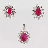 A 9CT GOLD, RUBY AND DIAMOND PENDANT and PAIR OF EARRINGS.