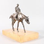 A HORSE AND JOCKEY on a marble base. 11ins long, 28cms long.