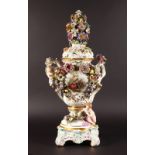 A SUPERB LARGE 19TH CENTURY MEISSEN FLOWER ENCRUSTED TWO HANDLED URN, COVER AND STAND, the lid as