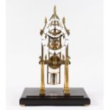 A GOOD CATHEDRAL BRASS SKELETON CLOCK with fusee movement, in a glass case. 1ft 9ins high.