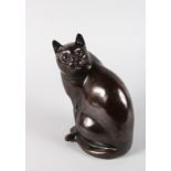 A JAPANESE BRONZE SEATED CAT. 8.5ins high. Signed.