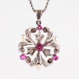 A DIAMOND, RUBY AND PEARL PENDANT on a chain.