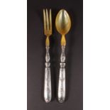 A PAIR OF SILVER HANDLED SALAD SERVERS with bone spoon and fork.