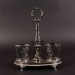 A FRENCH SILVER TWO BOTTLE CRUET STAND, oval with dolphin motifs and claw feet.