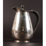 A LIBERTY & CO SILVER HOT WATER JUG with lid and wooden handle. Birmingham 1922.