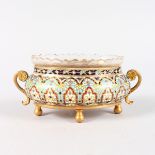 A SMALL FRENCH ORMOLU AND CLOISONNE ENAMEL OVAL TWO HANDLED BOWL with glass liner. 5.5ins long.