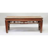 A CHINESE STAINED ELM LOW TABLE, LATE 19TH CENTURY, with a rectangular top, open frieze with