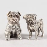 TWO SMALL SILVER NOVELTY PUG DOGS.