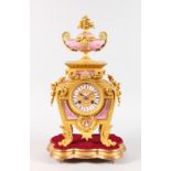 A GOOD 19TH CENTURY FRENCH GILT BRONZE CLOCK, with porcelain panels, eight-day movement striking