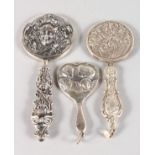 THREE SILVER MINIATURE HAND MIRRORS.