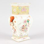 A SHAPED CHINESE VASE with ring handles and painted with flowers, with Jiaqing mark. 8ins high.