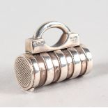 A SMALL SILVER NOVELTY PADLOCK.