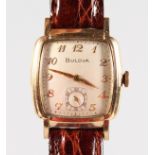 A GENTLEMAN'S BULOVA WRISTWATCH with leather strap.