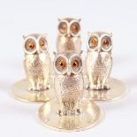 A SET OF FOUR SILVER OWL MENU HOLDERS. Chester 1904. Maker: S. M. & Co. 3cms high.