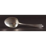 A STERLING SILVER TRIFFID END SERVING SPOON.