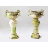 A VERY GOOD PAIR OF CARVED WHITE MARBLE CIRCULAR TWO HANDLED URNS ON STANDS, in the Chinese