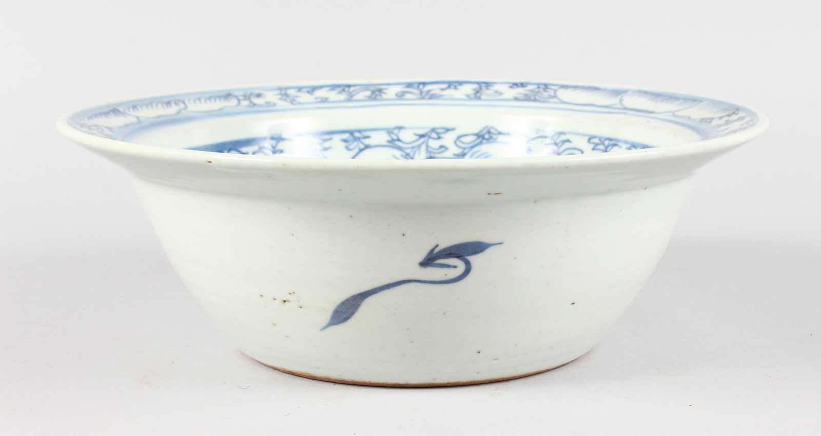 A CHINESE BLUE AND WHITE CIRCULAR BOWL. 11ins diameter.