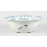 A CHINESE BLUE AND WHITE CIRCULAR BOWL. 11ins diameter.