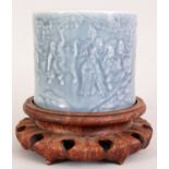 A GOOD QUALITY CHINESE CLAIRE-DE-LUNE MOULDED PORCELAIN BRUSHPOT, together with a fitted wood stand,