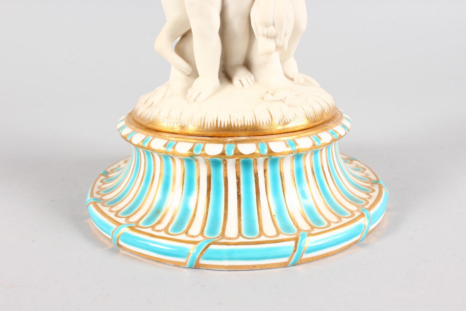 A MINTON CIRCULAR COMPORT, the stem with three bisque cupids. 26cms high. - Image 8 of 9