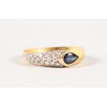 AN 18CT YELLOW GOLD, DIAMOND AND SAPPHIRE RING.