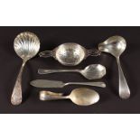 A TEA STRAINER, Sheffield 1929, CADDY SPOON, Birmingham 1928, JAM KNIFE AND SPOON and TWO LADLES (