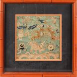 A SMALL FRAMED CHINESE NEEDLEWORK of dragons and emblems. 7ins x 7ins.