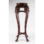 A CHINESE CARVED HARDWOOD AND MARBLE URN STAND, LATE 18TH/EARLY 20TH CENTURY, with a circular top on