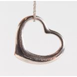 A LARGE HEAVY TIFFANY HEART SHAPED PENDANT AND CHAIN.