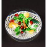 A GOOD ST LOUIS PAPERWEIGHT with white lattice work and fruit. 3.25ins diameter.