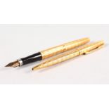 TWO PARKER FRANCE GILT PENS.