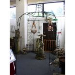 A LARGE WROUGHT IRON CIRCULAR PERGOLA. 4ft diameter, 8ft high.