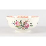 AN 18TH CENTURY LIVERPOOL POLYCHROME ENAMELLED BOWL painted with scattered floral spray with a