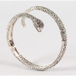 A LARGE SILVER AND MARCASITE SNAKE BANGLE.