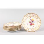 A SET OF SIX SMALL MEISSEN PLATES edged in gilt and painted with flowers. Cross swords mark in blue.