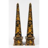 A GOOD REGENCY DESIGN BLACK TOLEWARE OBELISKS with Chinese decoration. 1ft 10ins high.