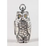 A SILVER PLATE NOVELTY OWL SOVEREIGN CASE.