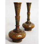 A GOOD SMALL PAIR OF TURKISH GOLD INLAY WOODEN BOTTLE VASES. 6ins high.