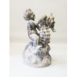 A Cast Lead Model of a Cherub Riding a Seahorse. 26" High