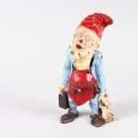 A PAINTED CAST IRON GNOME DOOR STOP. 10ins high.