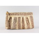 A SNAKESKIN BAG.