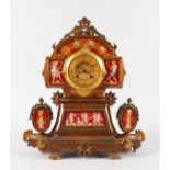 A RARE 19TH CENTURY FRENCH GILT METAL CLOCK with painted "TUSCAN" type porcelain panels, eight-day