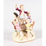 A SUPERB MEISSEN GROUP, A YOUNG MAN standing on a rock with four young musicians. Cross swords