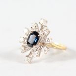 A GOOD 18CT YELLOW GOLD, DIAMOND AND SAPPHIRE CLUSTER RING.