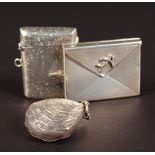 AN ENGRAVED VESTA, Birmingham 1905, MINIATURE ENVELOPE, .925 Roma, and SHELL PIN HOLDER (3).