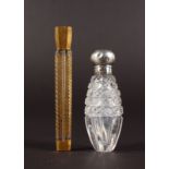 A VICTORIAN CUT GLASS SCENT BOTTLE with silver top, and a gilt scent bottle (no stopper).
