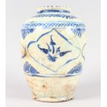 AN ISLAMIC POTTERY CRACKLE GLAZE BLUE AND WHITE GINGER JAR. 11ins high.