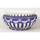 A WEDGWOOD & CO LTD BLUE AND WHITE JASPER WARE CIRCULAR FRUIT BOWL. 9ins diameter.